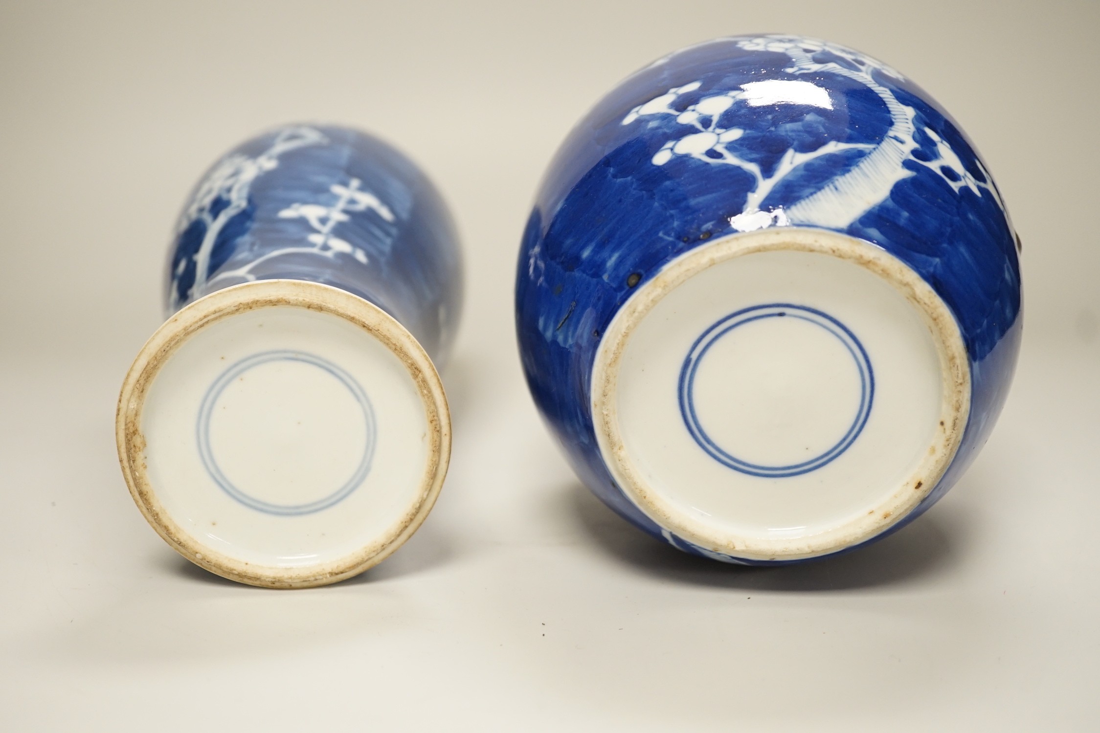 A Chinese blue and white prunus vase and a similar jar, late 19th century, vase 13.5cms high